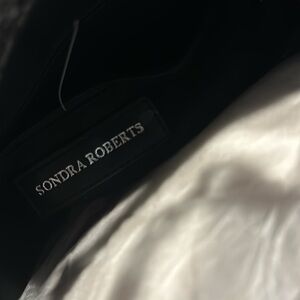 Sondra Robert’s snakeskin faux tote